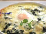 Receta Huevos al plato con espinacas y salsa de queso