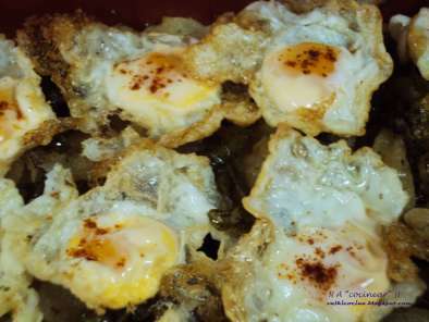 Patatas a la provenzal con huevos de codorniz