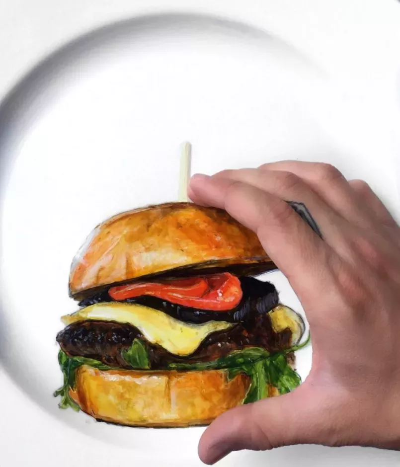 Grabbing-Burger-Plate-close-up-877x1024