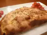 Receta Calzone de frankfurt, cebolla frita y aceite de orégano