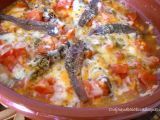 Receta Anchoas del cantábrico gratinadas con tomate y mezcla de quesos