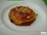 Receta Tartaleta de cebolla, tomate y queso con romero