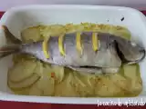 Receta Besugo al horno sobre patatas