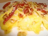 Receta Raviolis de queso manchego con pesto de frutos secos y tomate