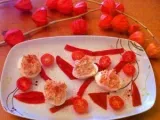Receta Huevos rellenos de atún sobre mosáico rojo de tomate cherry y pimientos del piquillo