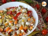 Receta Ensalada de arroz vegetariana: maíz, queso feta, zanahorias, guisantes, tomate y menta