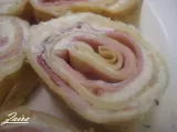 Receta Rollitos de crepes con jamón y queso