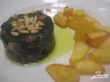Receta Espinacas salteadas con pasas y piñones y patatas española