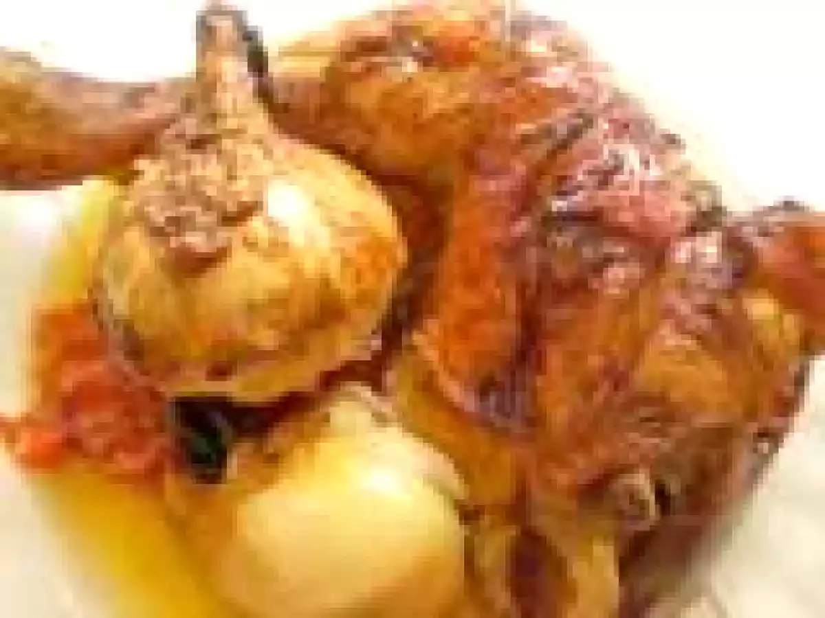 Rostit de pollastre i galtes de porc al forn de llenya