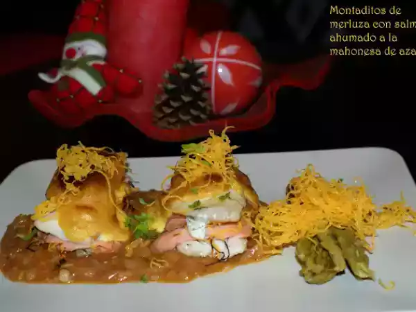 Receta Montaditos de merluza con salmón ahumado a la mahonesa de azafrán.