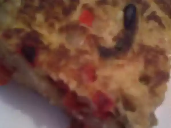 Receta Tortilla de patatas con pimiento y ajos tiernos