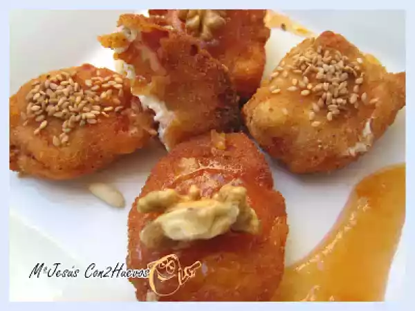 Receta Bocaditos de jamón rellenos de queso nueces y piñones