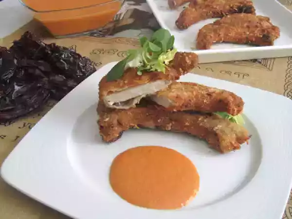 Receta Chuletas de cerdo rebozadas con romesco