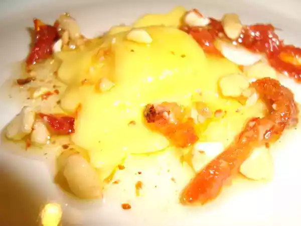 Receta Raviolis de queso manchego con pesto de tomate y frutos secos