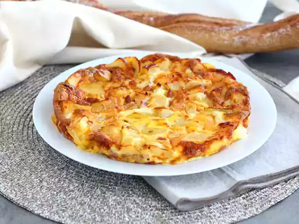 Receta Tortilla de patatas y queso al horno