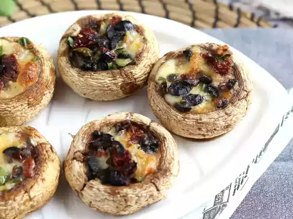 Receta Champiñones rellenos con queso y gratinados al horno