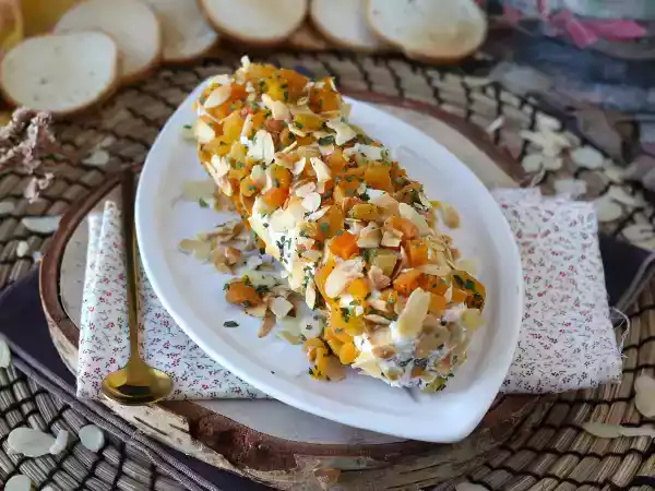 Receta Tronco de queso crema de queso con orejones, jamón serrano y almendras