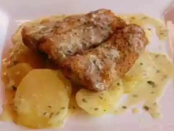 Receta Merluza con costra, patatas y salsa verde