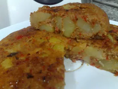 Receta Tortilla de patatas con confitura de cebolla y pimiento