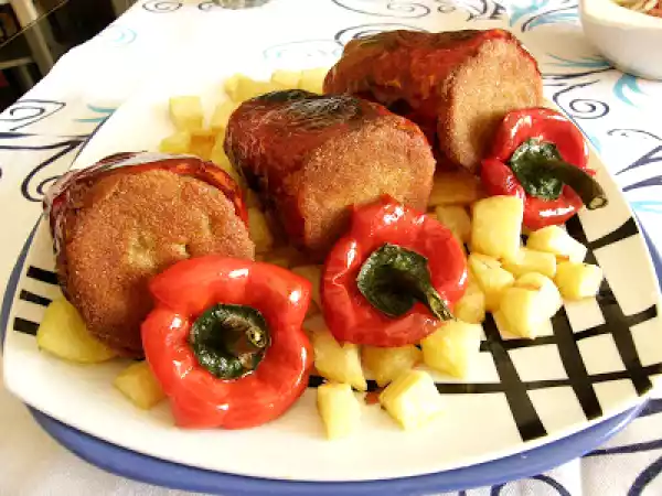 Receta Pimientos fritos rellenos de berenjenas y arroz.