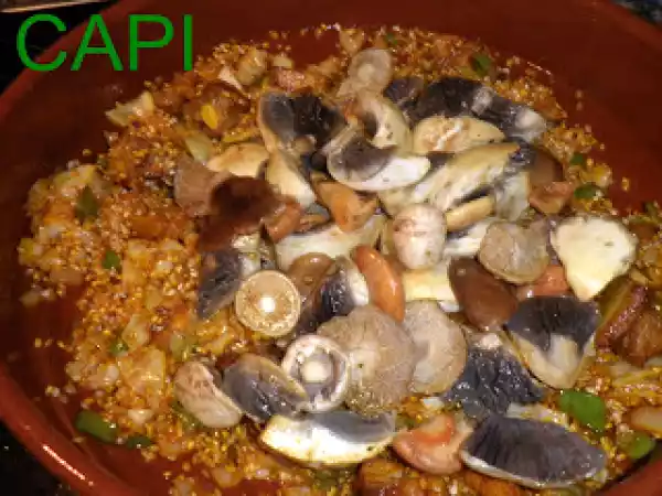 Receta Arroz de costillas y lomo con setas y hongos de otoño.