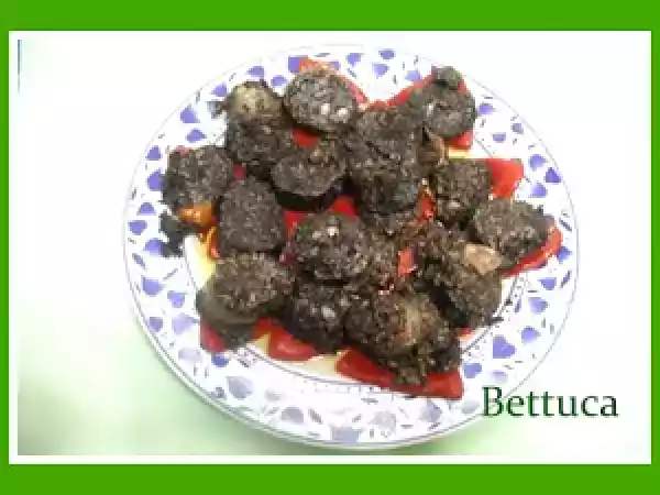 Receta Morcilla frita con cama de pimientos del piquillo