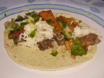 Receta Tacos de carne asada con pico de gallo.