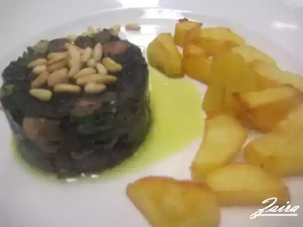 Receta Espinacas salteadas con pasas y piñones y patatas española