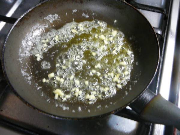 Pescado al horno con hongos y crema - Preparación paso 5