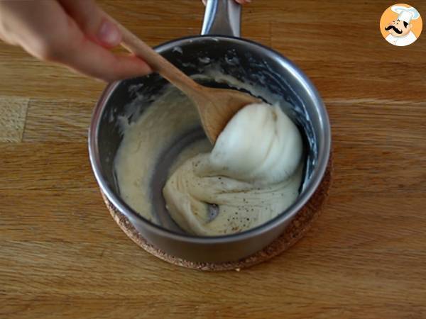 Crepes rellenos de bechamel, queso y jamón - Preparación paso 7