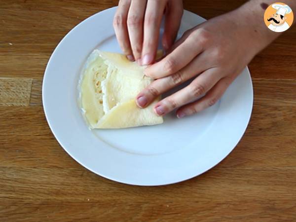 Crepes rellenos de bechamel, queso y jamón - Preparación paso 9