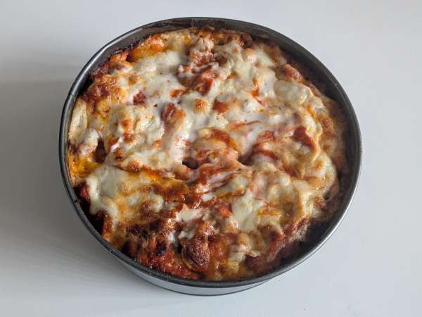 Timbal de rigatoni al horno con salchicha, bechamel y mozzarella - Preparación paso 13