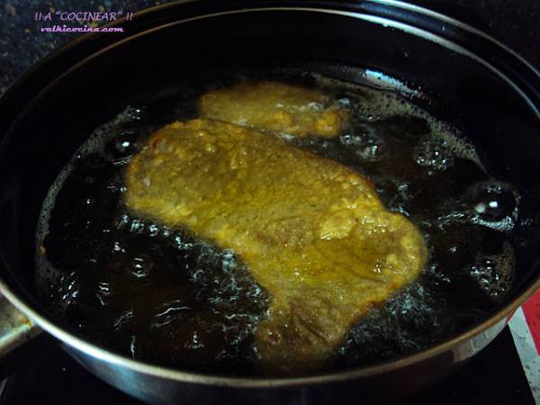 Escalope o filete de ternera empanado con queso y orégano - Preparación paso 5