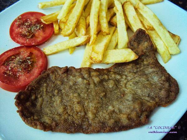 Escalope o filete de ternera empanado con queso y orégano - Preparación paso 6