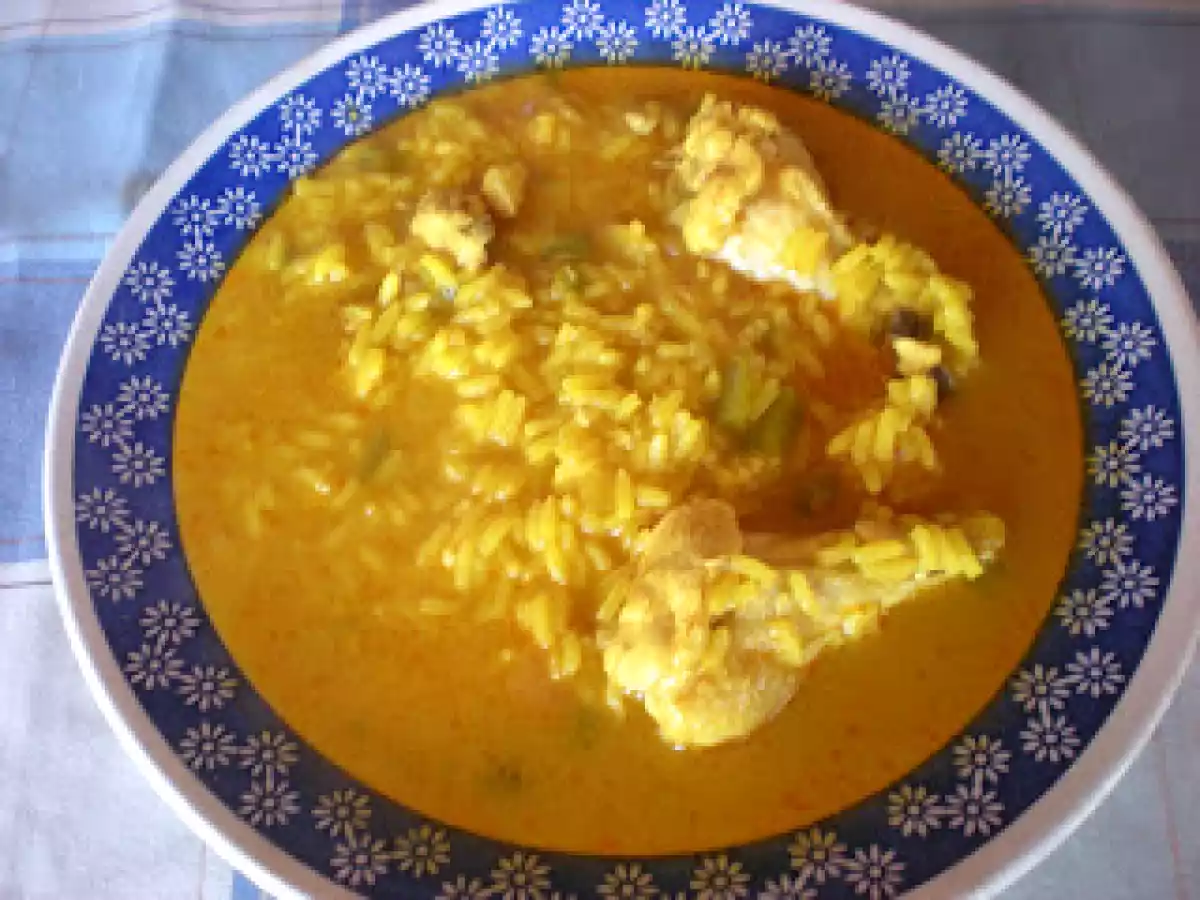 Alitas de pollo en arroz caldoso