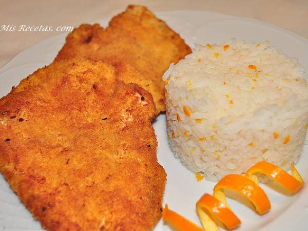 Arroz a la naranja con filetes empanados