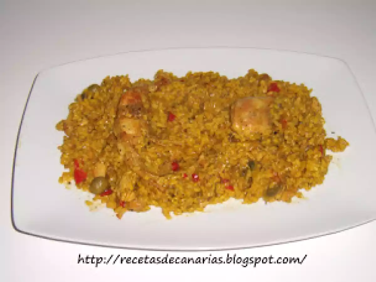 Arroz amarillo con conejo