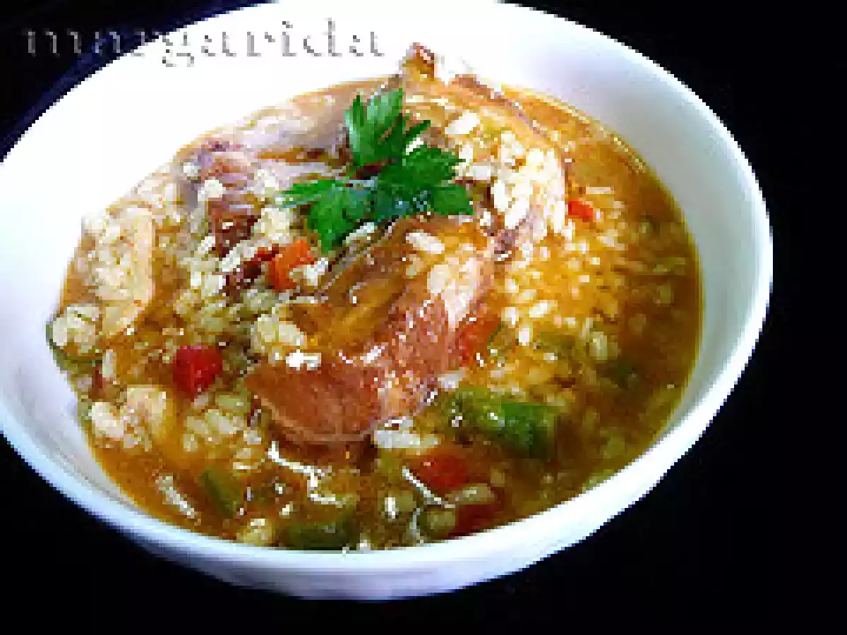 Arroz caldoso con pollo y cerdo