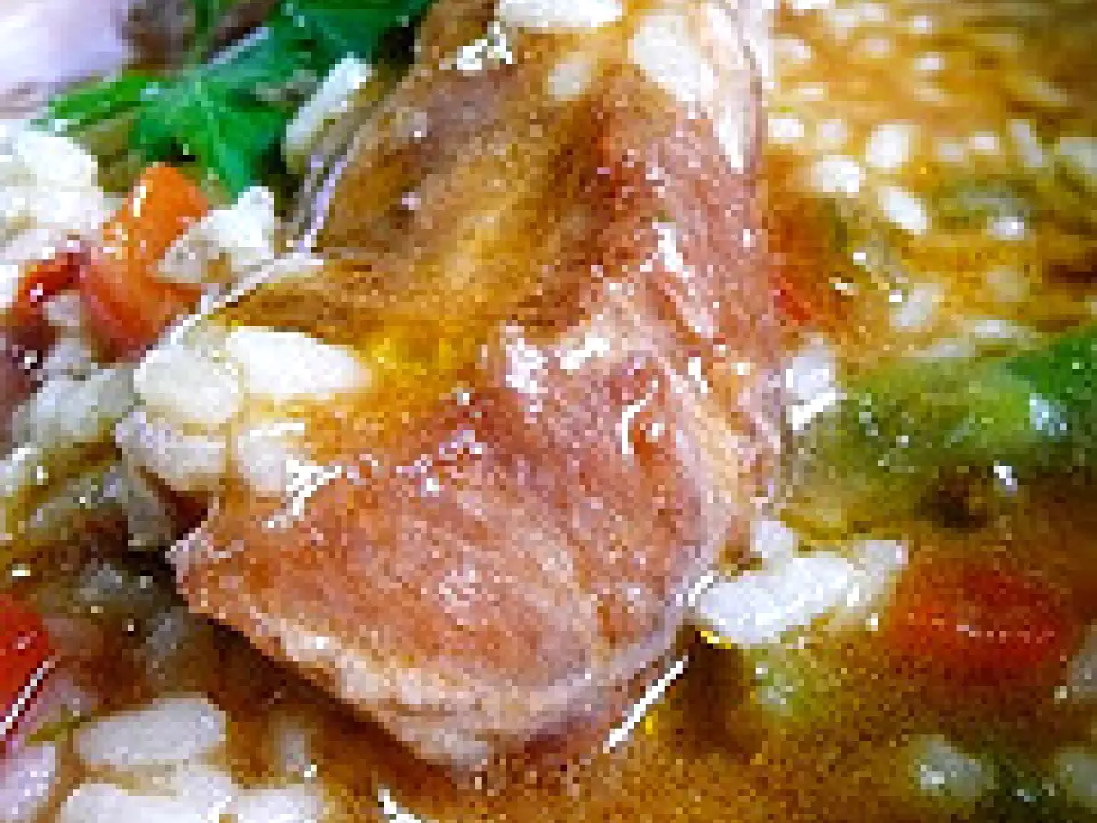 Arroz caldoso con pollo y cerdo - foto 2