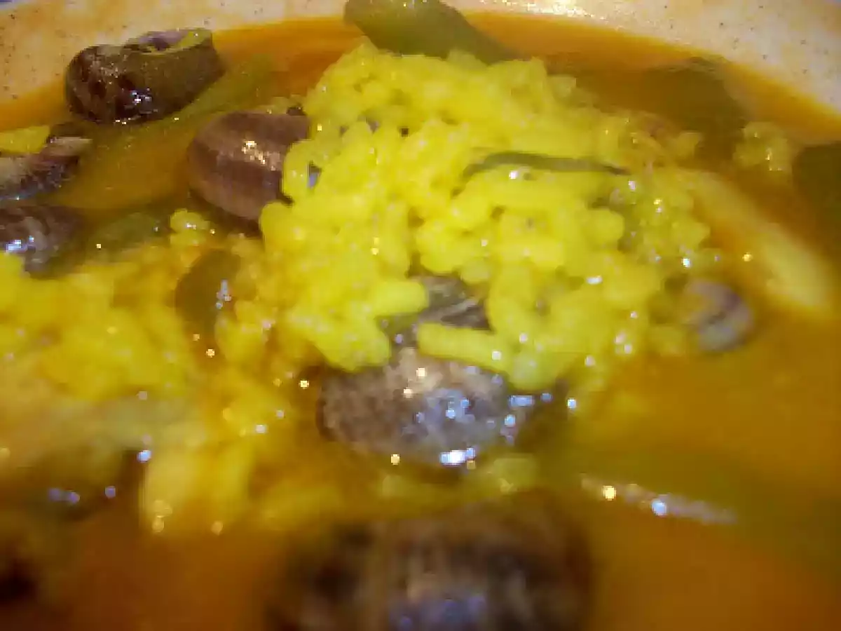 Arroz caldoso de pollo y caracoles - foto 2