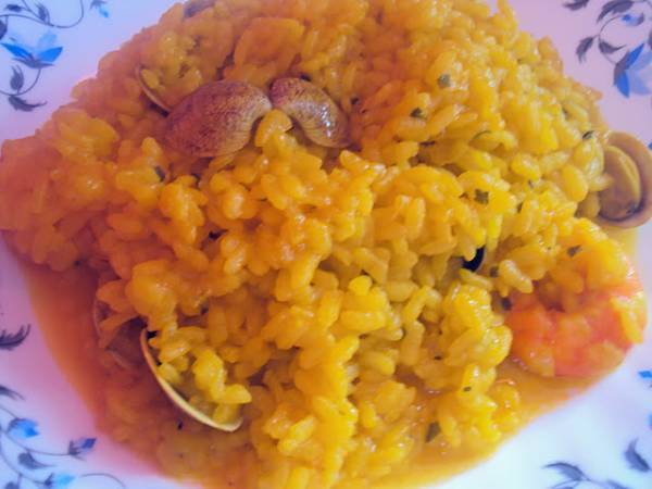 Arroz con almejas y langostinos