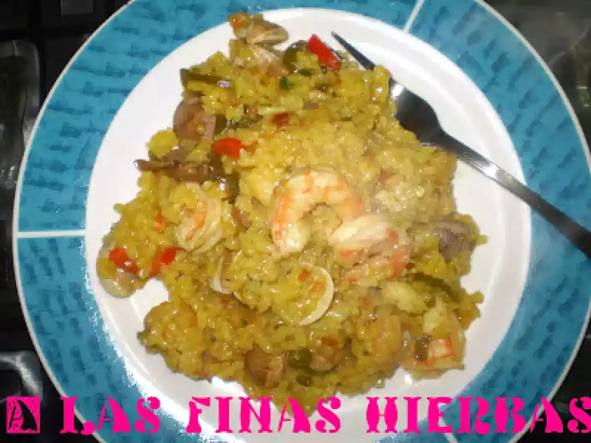 Arroz con pescado, gambas y setas - foto 3