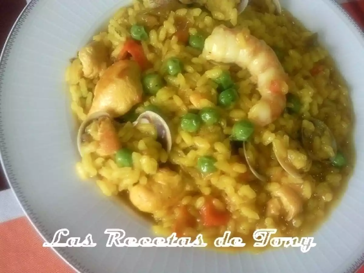 Arroz meloso con gambas y almejas - foto 4