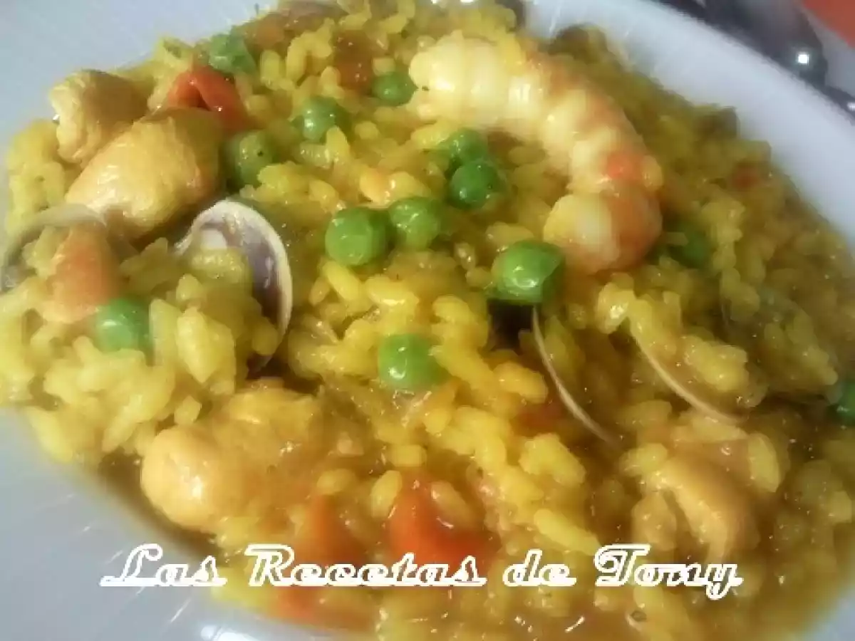 Arroz meloso con gambas y almejas - foto 5