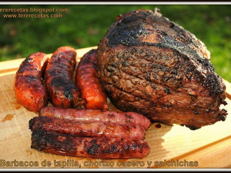 Barbacoa de tapilla, chorizo casero y salchichas., foto 1