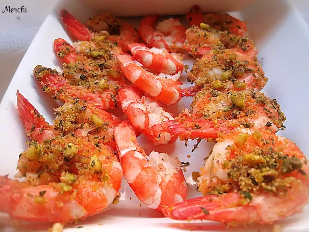 Brochetas de langostinos en salsa de pistachos