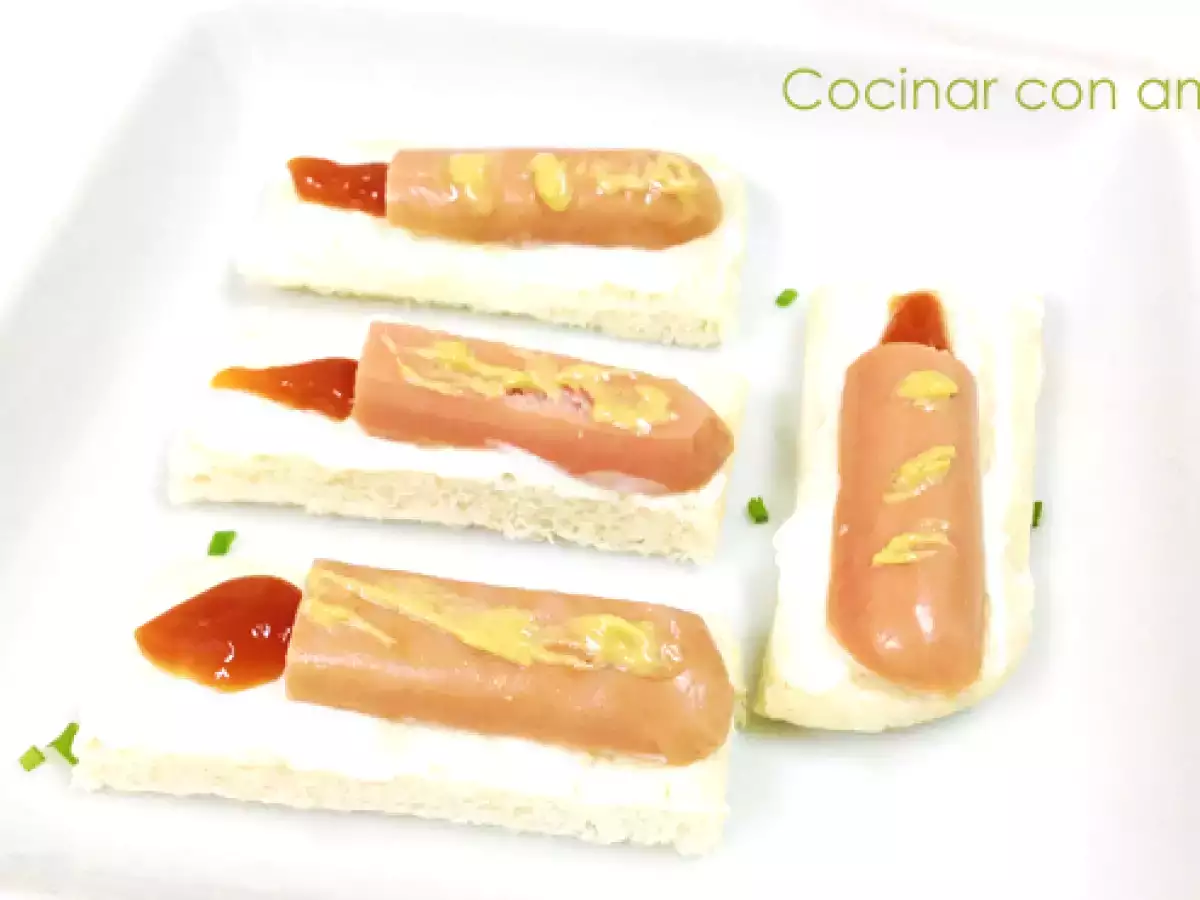 Canapé de salchicha con forma de vela