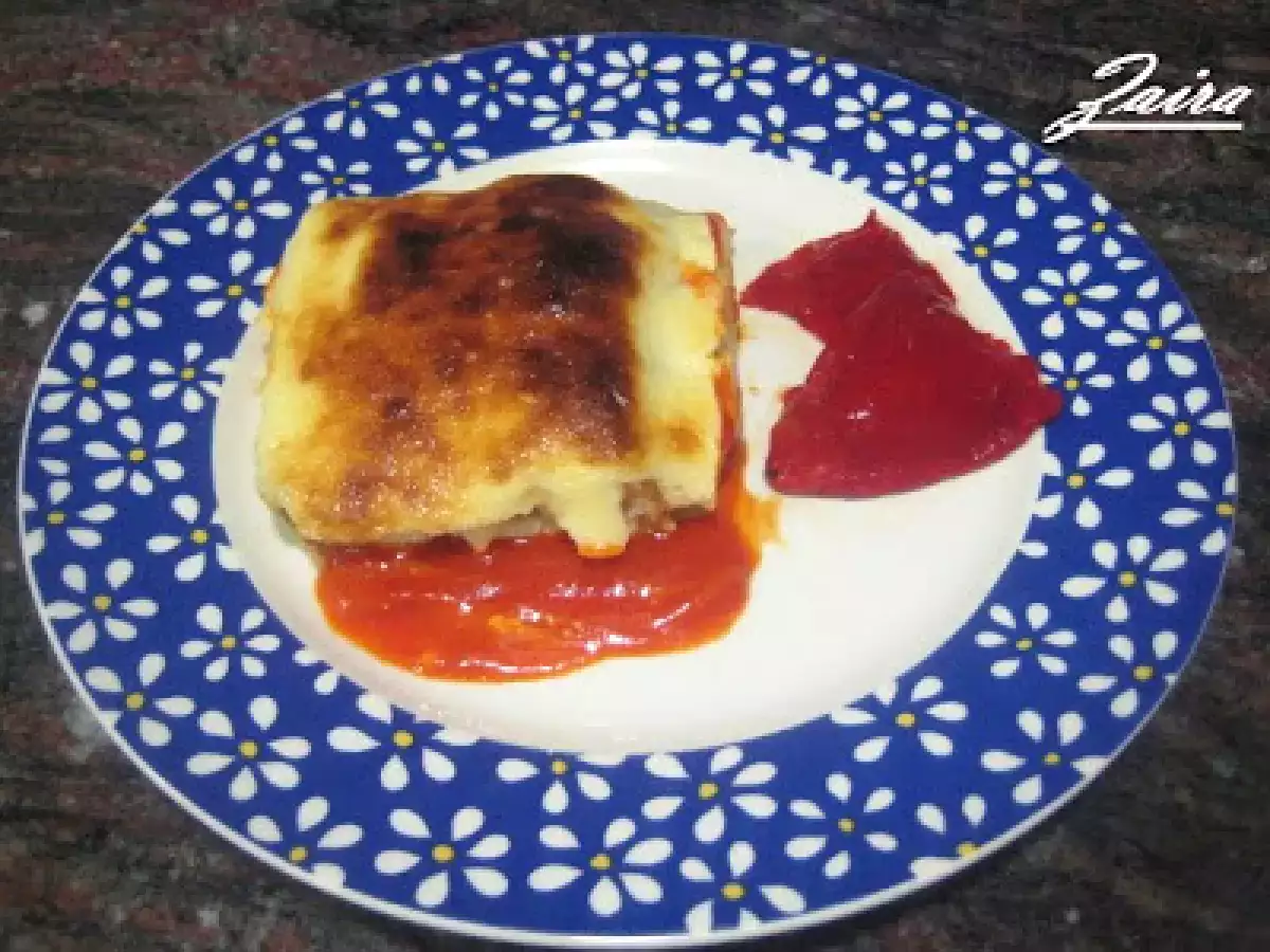 Canelones de bonito con muselina de ajo y coulis de pimientos - foto 2
