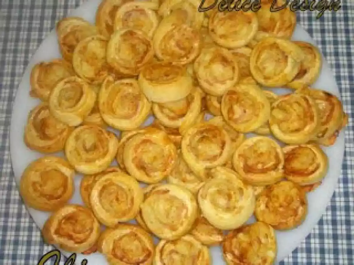 Caracoles de jamón y queso