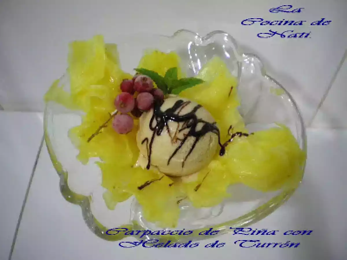 CARPACCIO DE PIÑA CON HELADO DE TURRON. - foto 3